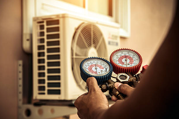 Professional Air Conditioning Service technician working in North Grosvenordale, CT